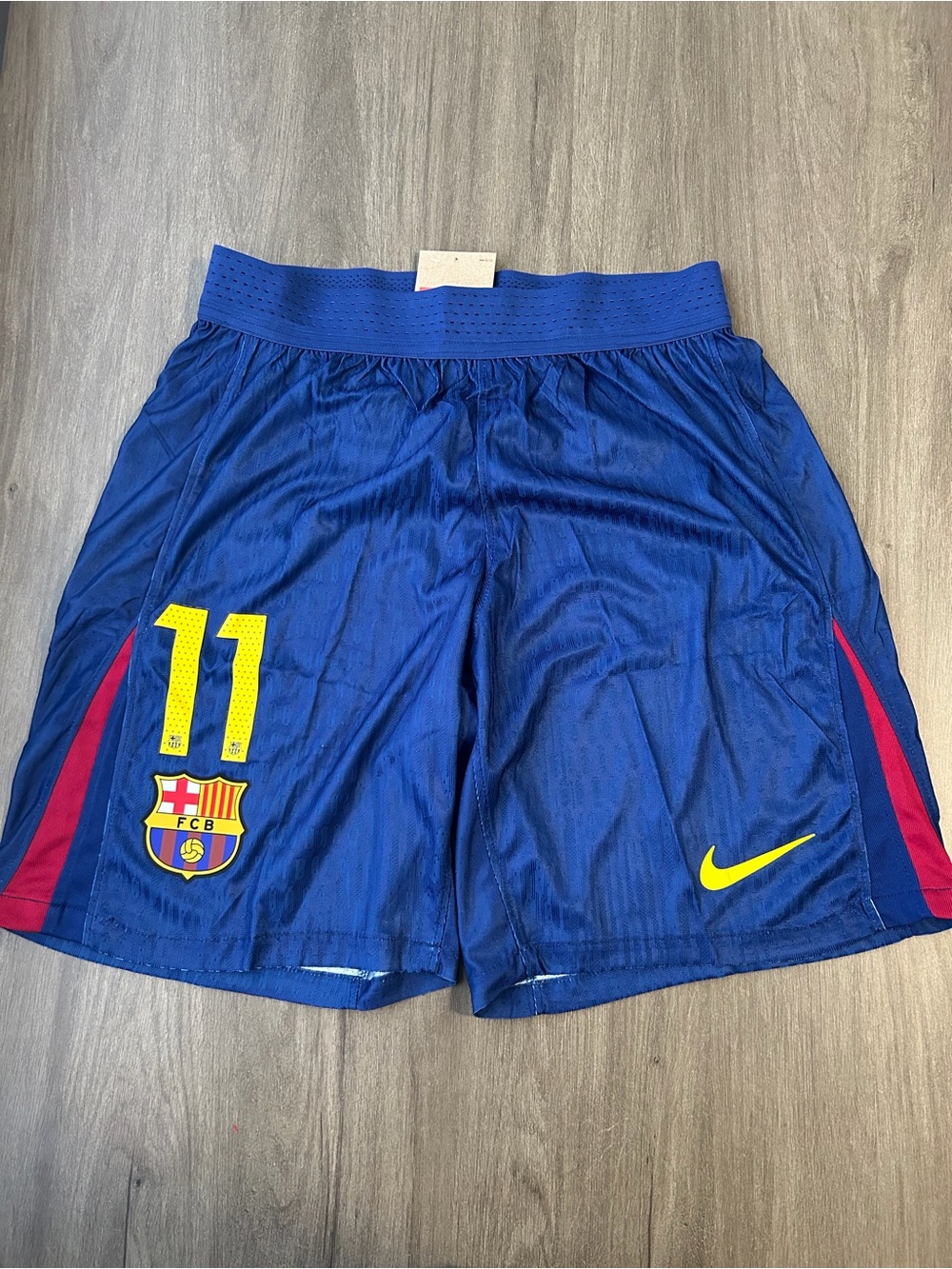 Nike Men's Royal Blue Athletic Shorts with Yellow Accents